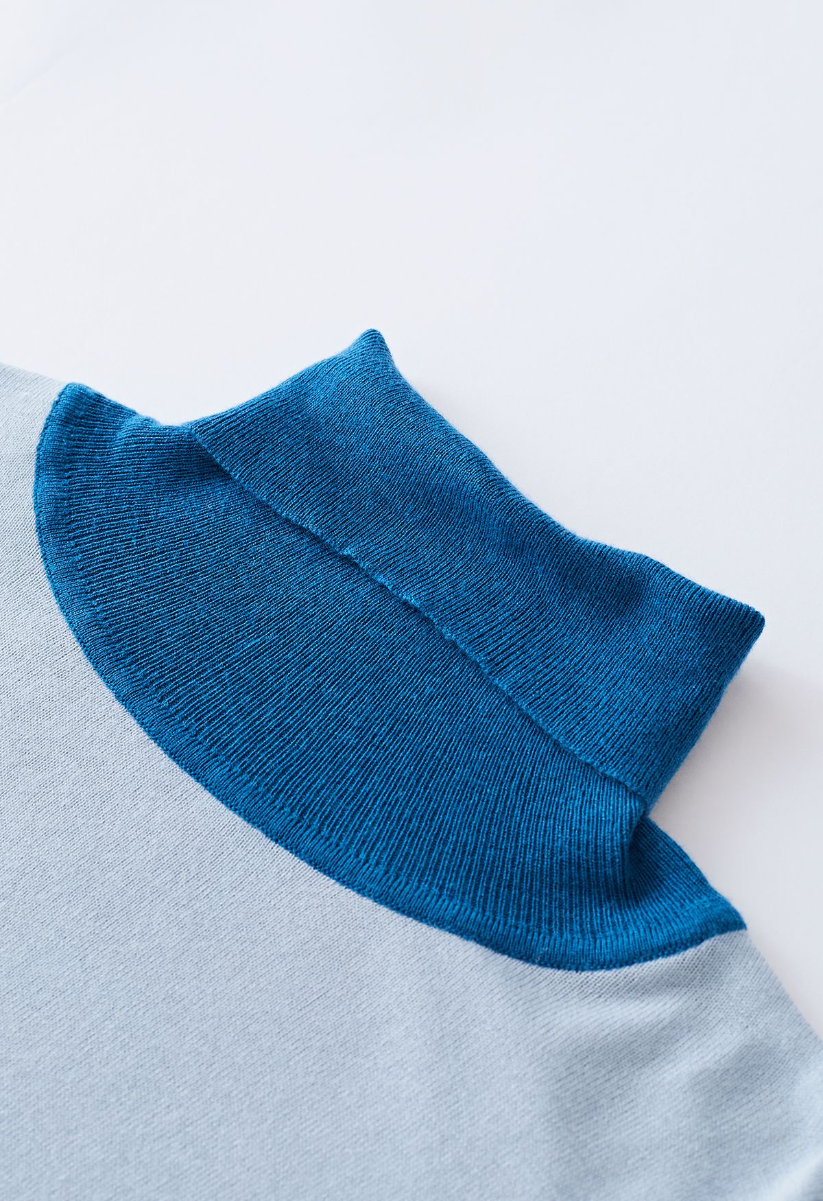 Color Blocked Turtleneck Knit Top in Baby Blue